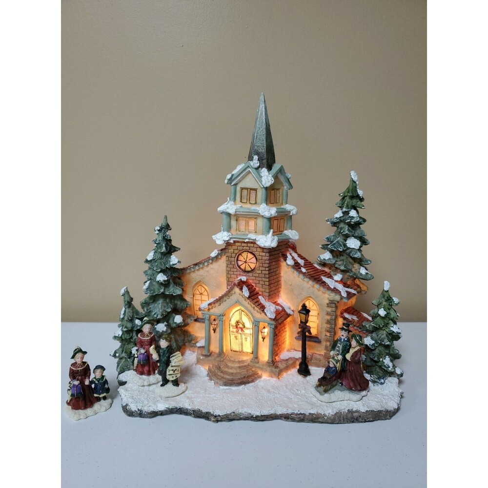 WMC Imports Snowblazers Township Lighted Resin Church with Figurines Christmas